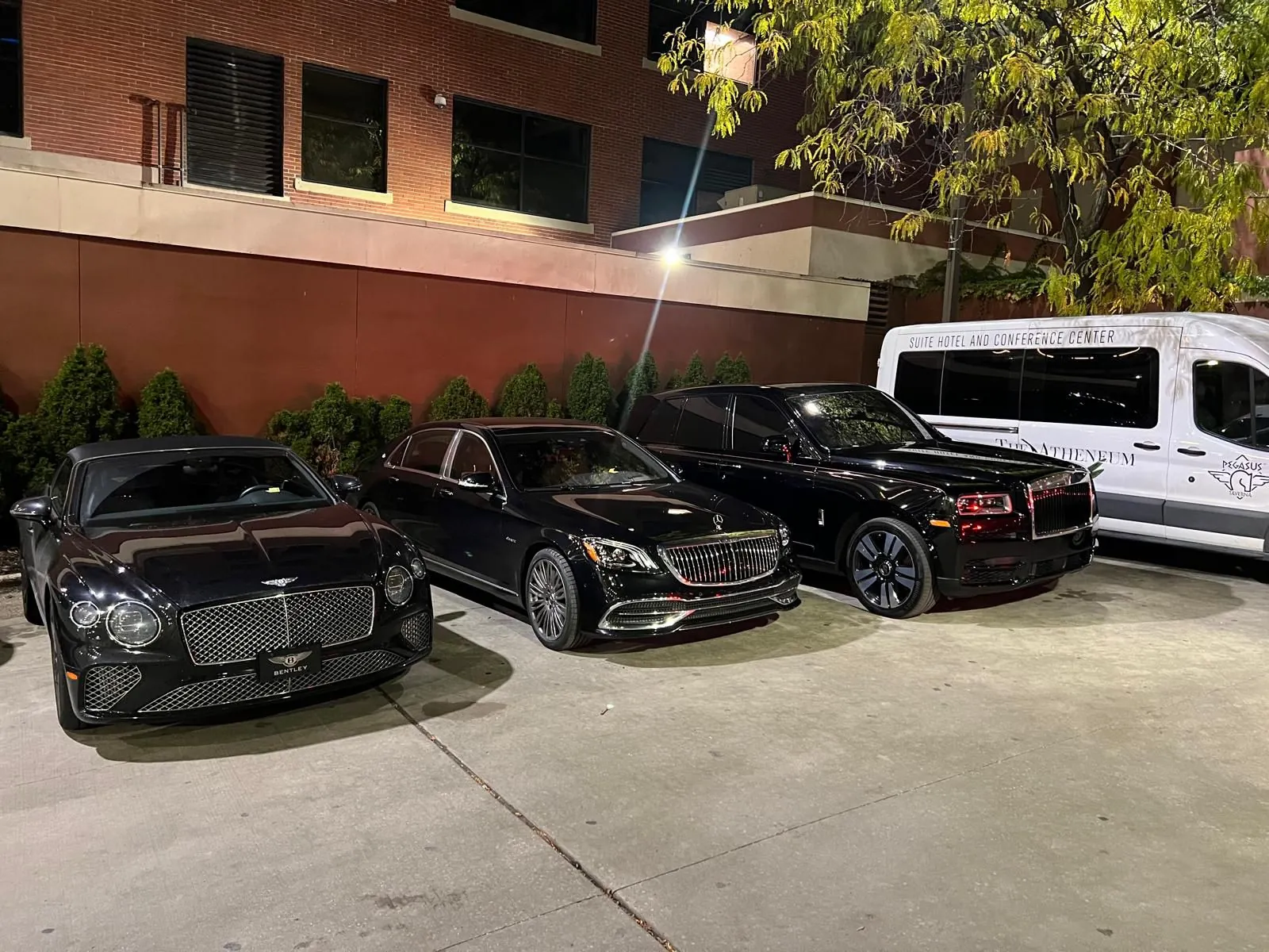 Guest vehicles parked by Acropolis hotel valet